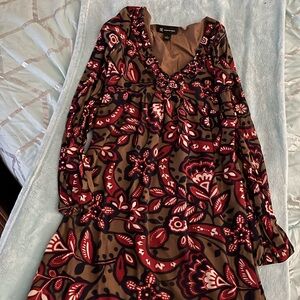 **TWO Dresses**
1)Floral Print Dress Red and Brown
1)One  multicolored  dress.